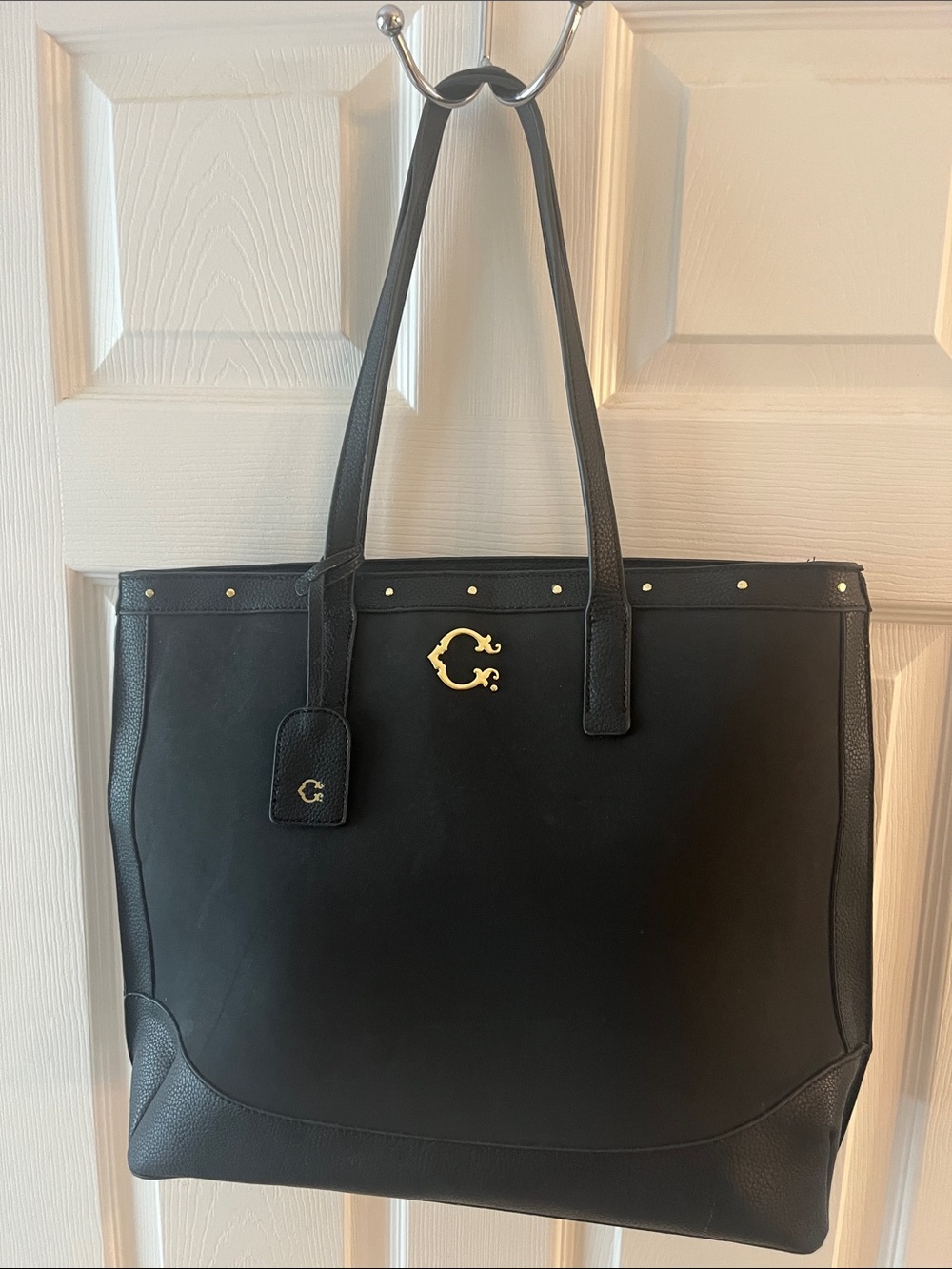 C. Wonder Black Leather Tote with Gold 'C' Logo